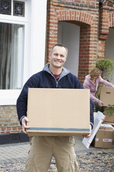 Household storage space in Silvertown with organized boxes and furniture